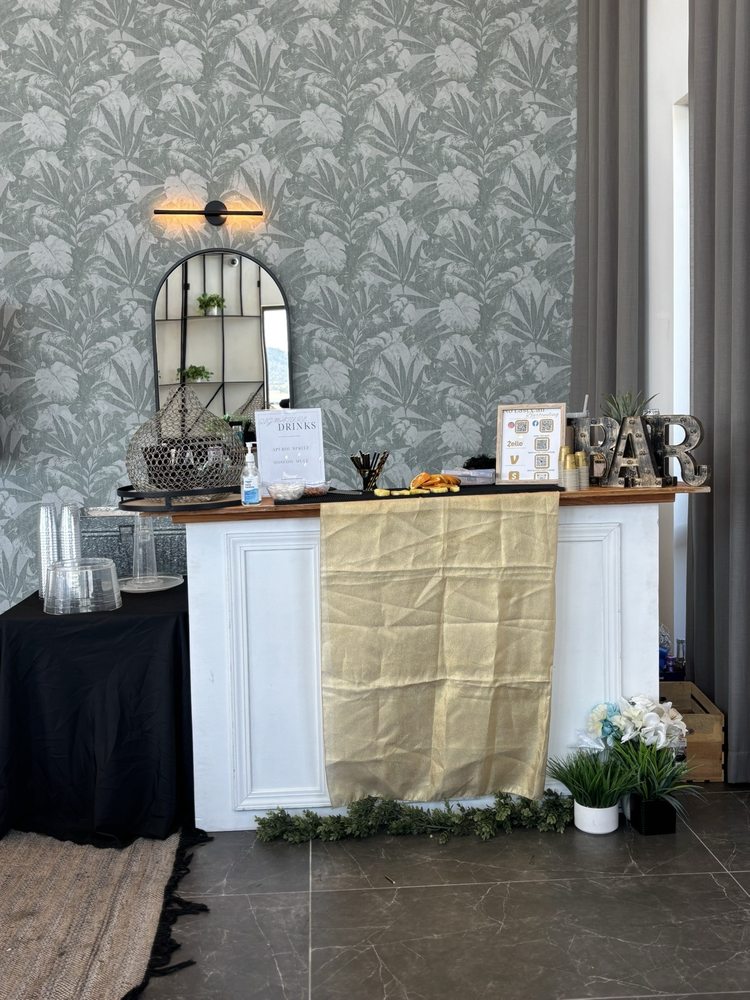 Custom bar menu and cocktails displayed at No Last Call Bartending event